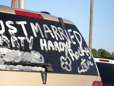 Just Married Bandit Sign on Minivan