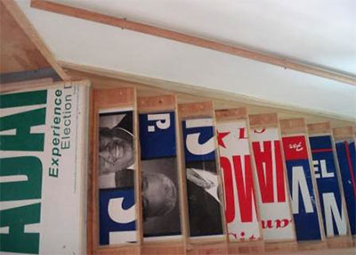 Staircase with Temporary Treads Made of Old Political Campaign Signs