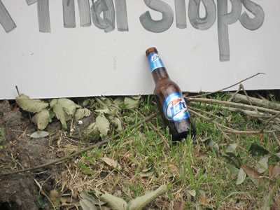Beer Bottle Next To Sign, Shepherd Dr., Greenbriar, Houston, after Hurricane Ike