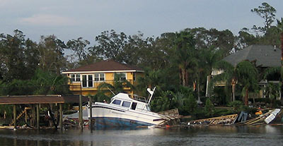 House and Damaged Boat on Taylor Lake, Taylor Lake Village, Texas, after Hurricane Ike