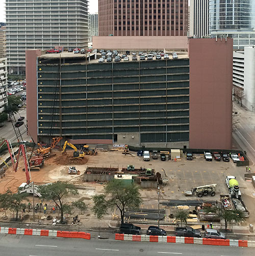 View of Construction Site at 1311 Louisiana St. with Wedge International Parking Garage in Background, Downtown Houston