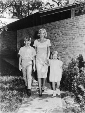 Schirra Family in Front of Home on Pine Shadows Dr., Timber Cove, Houston