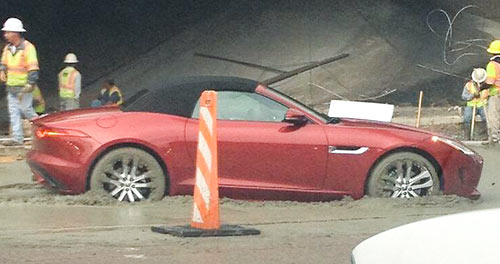 Jaguar Stuck in Concrete at Buffalo Speedway and Southwest Fwy., Greenway Plaza, Houston
