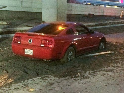 Mustang Stuck in Concrete, Southwest Fwy. Feeder Rd. at Greenbriar, Upper Kirby, Houston