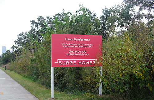 surge-homes-sign-emes-place