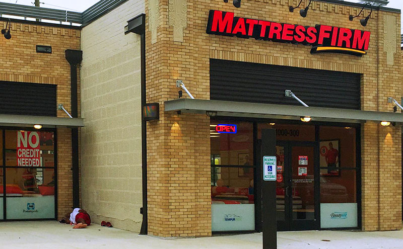 Man Sleeping Outside Mattress Firm, 1000 West Gray St., North Montrose, Houston